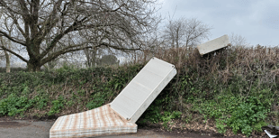Bedstead and mattress dumped in lay-by 