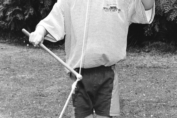 Six year old Adam Elms trying out a diablo at Teignmouth Community Festival back in June 1994