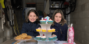 Sisters' garage cake sale for Rowcroft 