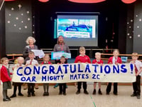 Tales of high sea float pupils' boat