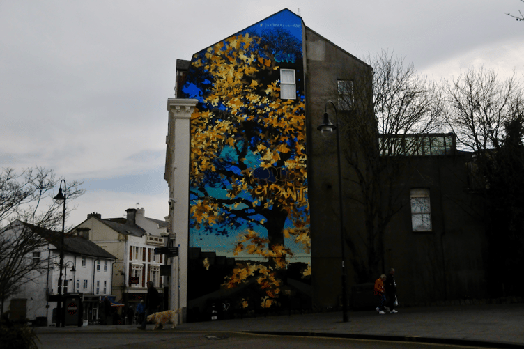 The mural was painted by artist Joe Webster