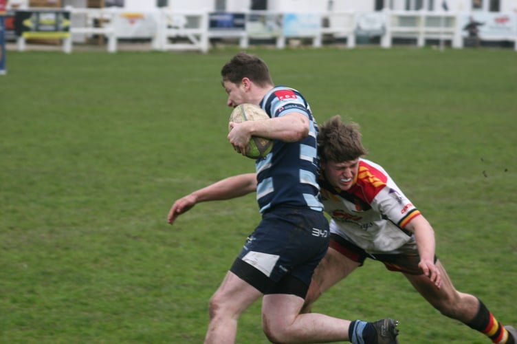 Toby Pascoe tackles for Newton Abbot RFC
