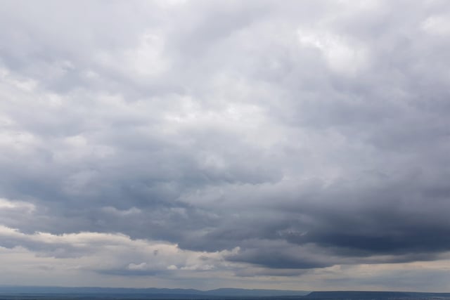 Mist clearing to sunny spells today then patchy rain tomorrow