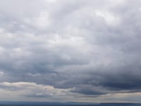 Misty morning with partly cloudy skies and rain tomorrow