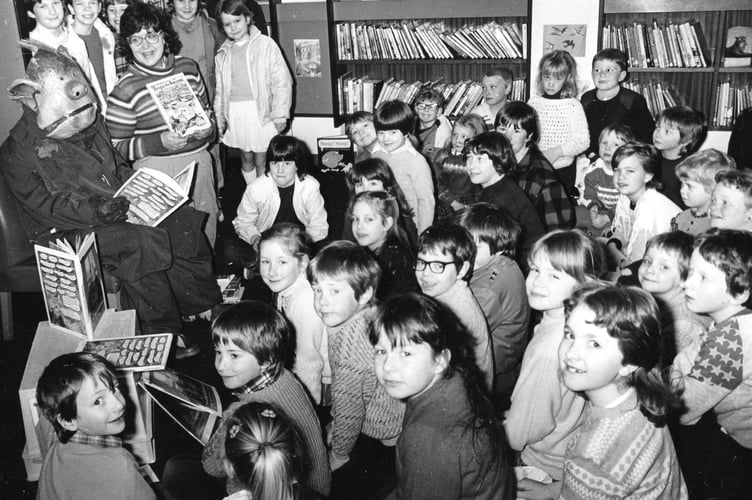 April 1986 and the Raymond Briggs character Fungus the Bogeyman puts in an appearance to delight youngsters at Teignmouth Library