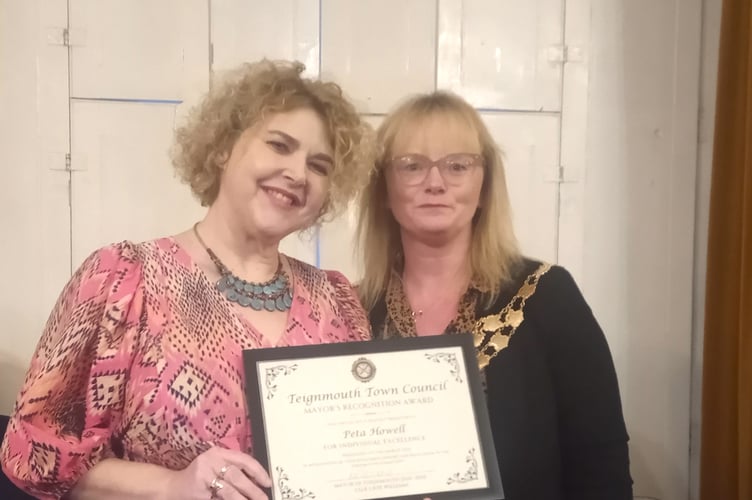 Peta Howell received the Mayor's Choice award for her work at the Alice Cross Centre.