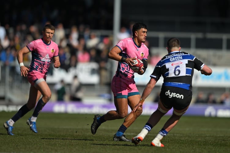 Exeter Chiefs centre Tamati Tua looks to find a way around Bath's Arthur Green