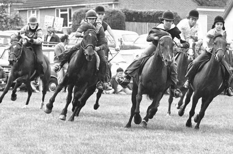 Action from the  mounted potato race for youngsters under the age of fifteen at the Christow Show in  the mid-1970s