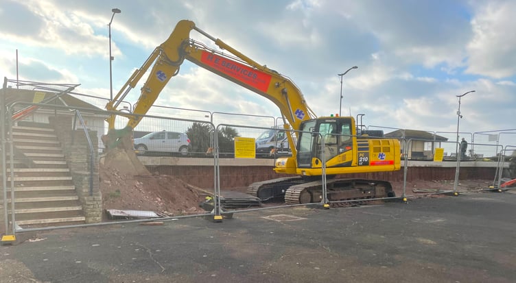 Diggers are back on the Den in Teignmouth to take down the concrete staircase at the site of the planned new toilet block