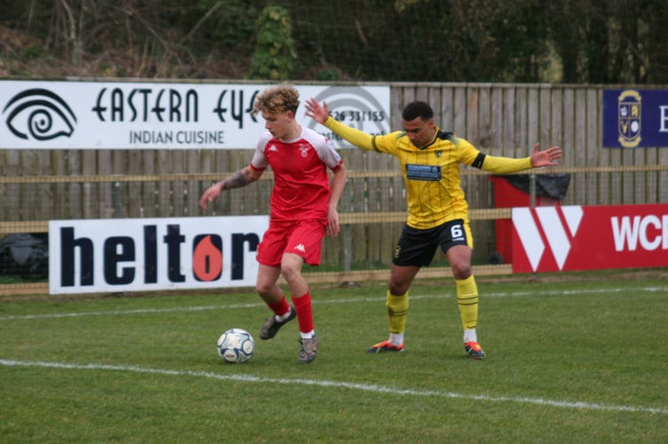 Buckland Athletic defender Myles James in action