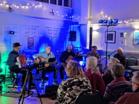 Musicians raise nearly £1000 for community centre