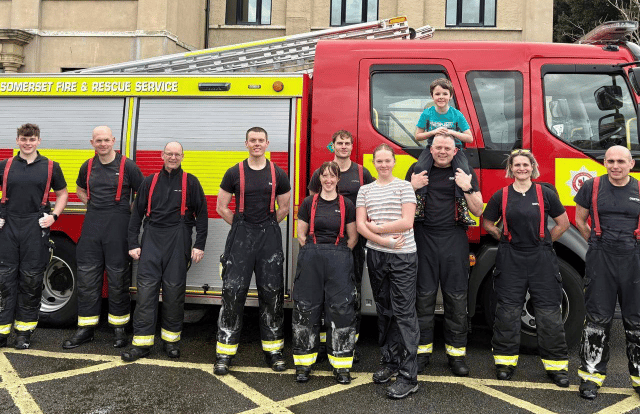Firefighters scrub and chamois their way to £2,000 for charity 