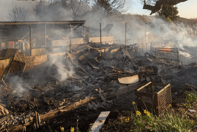 The barn had an asbestos roof and so crews had to deploy specialist equipment.