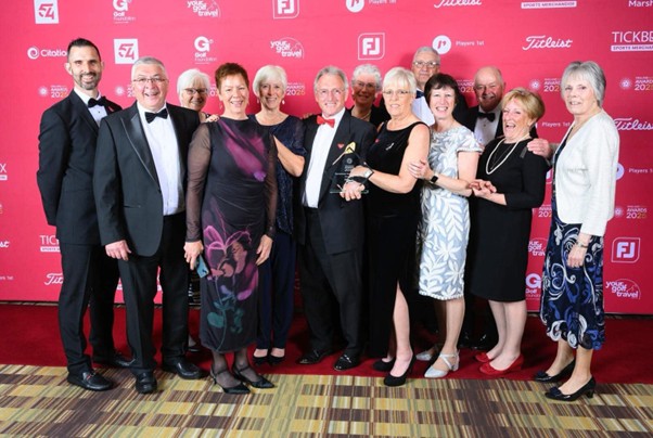 Stover GC representatives collect award