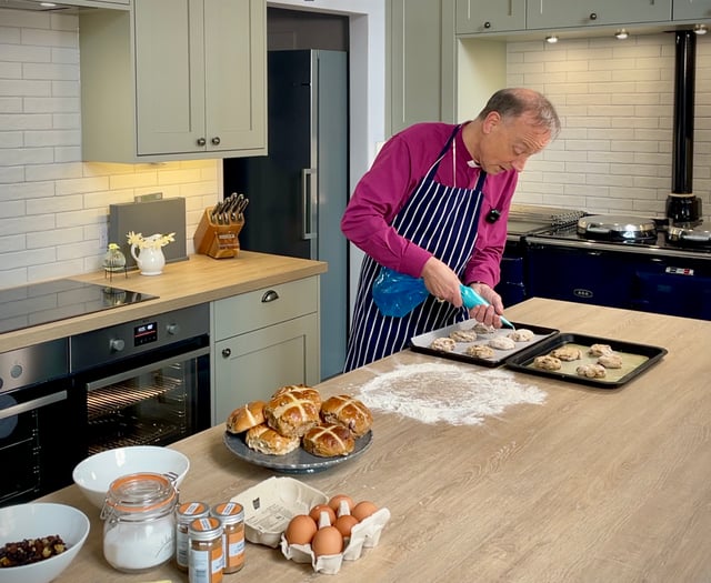 Bishop of Exeter prepares for Easter by baking hot cross buns
