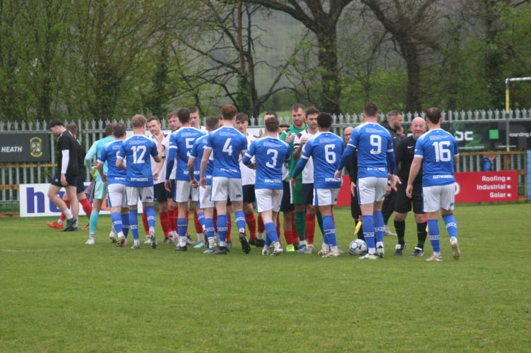 Buckland Athletic and Wellington FC players pre-game