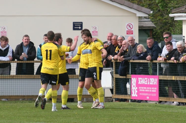 Buckland Athletic celebrate an Owen Stockton goal