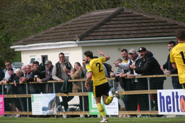Owen Stockton wheels away in celebration for Buckland Athletic