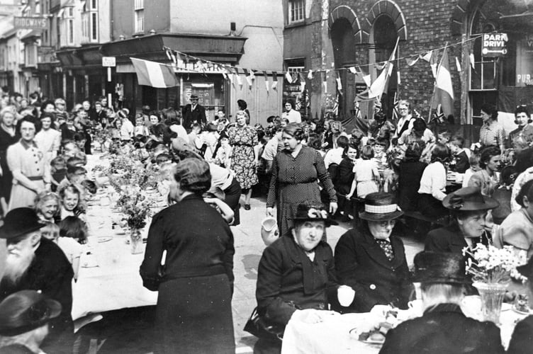 VE Day celebrations from May 1945. Street party in Newton Abbot town centre