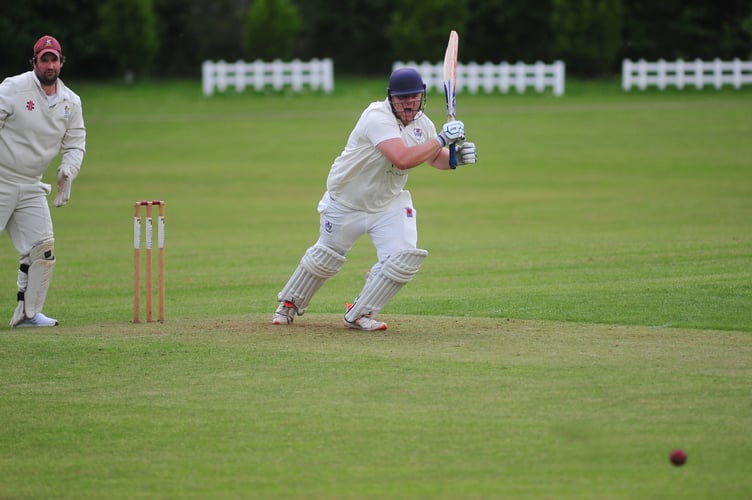 Devon Cricket League C Division West.Ipplepen 2nd XI versus Kingsbridge 1st XI. Pen's 'keeper A Peters and  Kingsbridge batsman  A Chandler