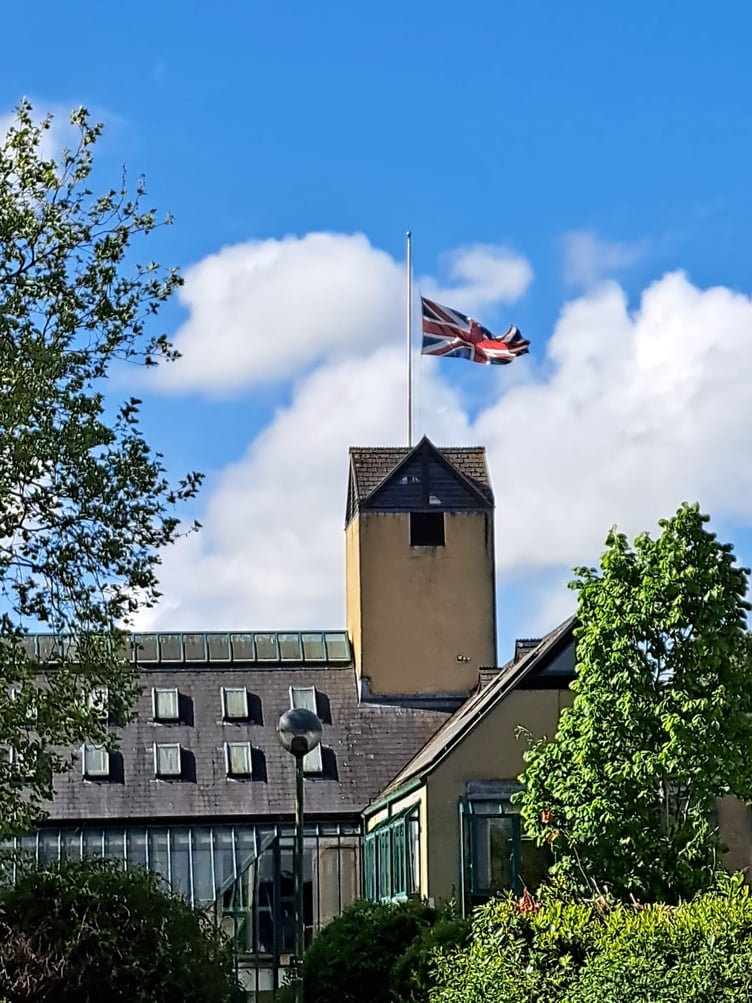 Union flag being flown at half mast at Teignbridge Council headquarters for the 80th anniversary of VE Day. Photo TDC