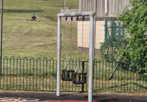 Teenager rescued from baby swing