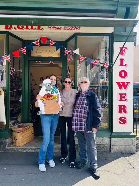 Chudleigh town councillors Gina Sherwood, mayor Emma Hares and Michael McCormick with one of the sheep plaques