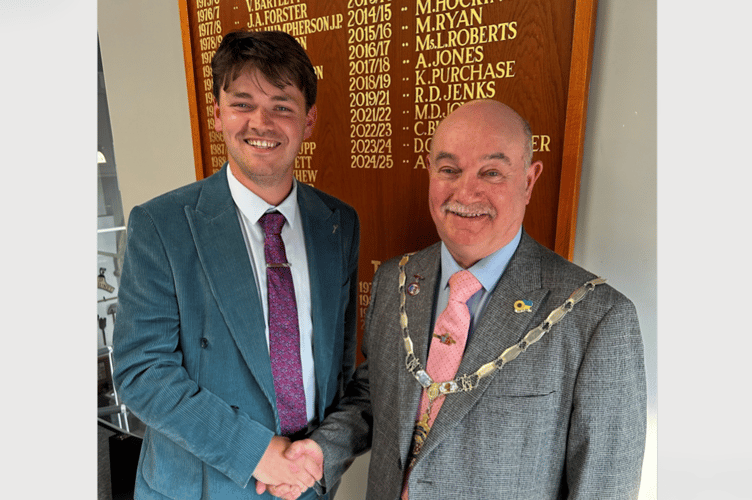 Outgoing Mayor Cllr Alex Hall, left, with new mayor Cllr Colin Parker