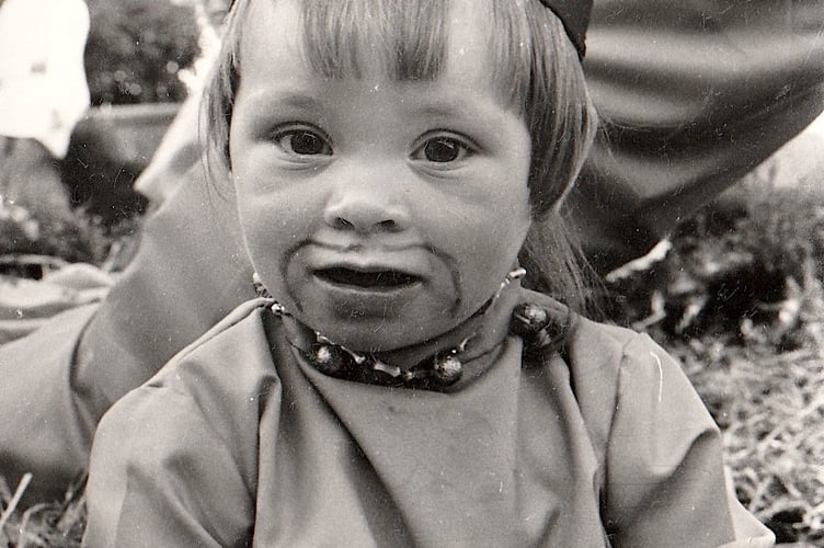 Mystery carnival. This youngster, sadly we don't have his name, was dressed up for the parade . Anyone recognise the little child (who will now be in their 50s!)