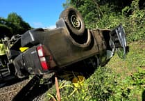 Overturned truck and garage crash... all in a day's work for Teignbridge fire crews!