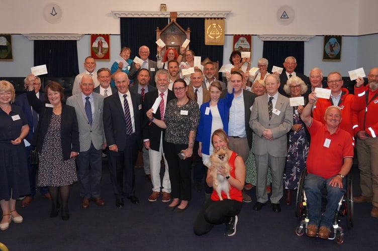 Devon Freemasons hand out donations to 20 charities and organisations. 