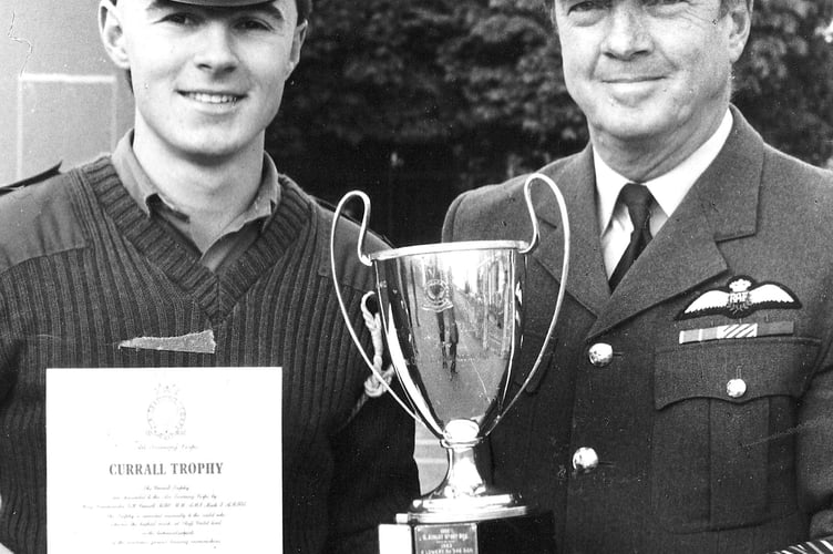Group Captain Kenneth Goodwin, the Air Training Corps South West Regional Commandant, presents Cadet Warrant Officer Darren Wills of 1322 (Newton Abbot)  Squadron with the Currall Trophy