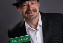 Back injury prompts flurry of activity for Dawlish author