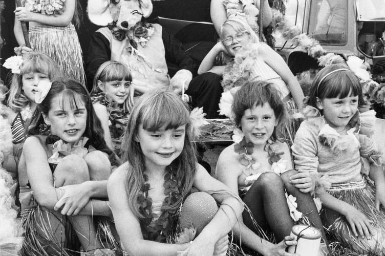 Moretonhampstead Carnival from August 1986 and the 2nd Moreton Brownies are pictured here with their float Roland Rat in Hawaii