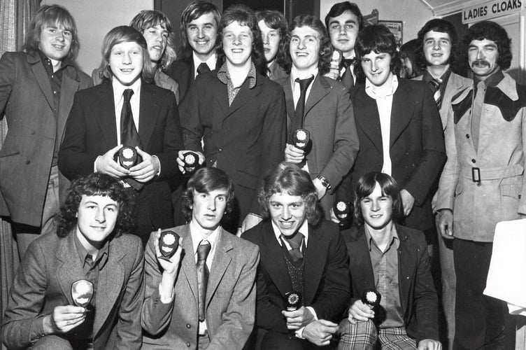 Players from Liverton AFC pose with trophies at their annual awards night in May 1973