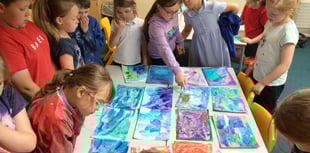 Artist helps children paint stories