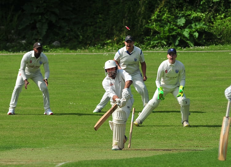 Devon Cricket League C Division West. Ipplepen 2nd XI versus South Devon 1st XI. Pen's J Heath is dispatched from the crease by a ball from J Martin
Ipplepen won the toss and chose to field with South Devon making 176 all out after 41.2 overs. Pen's took to the crease after tea and responded with 177/9 after 39.5 overs securing a one wicket win