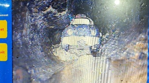 A toy car found in a 100mm diameter pipe