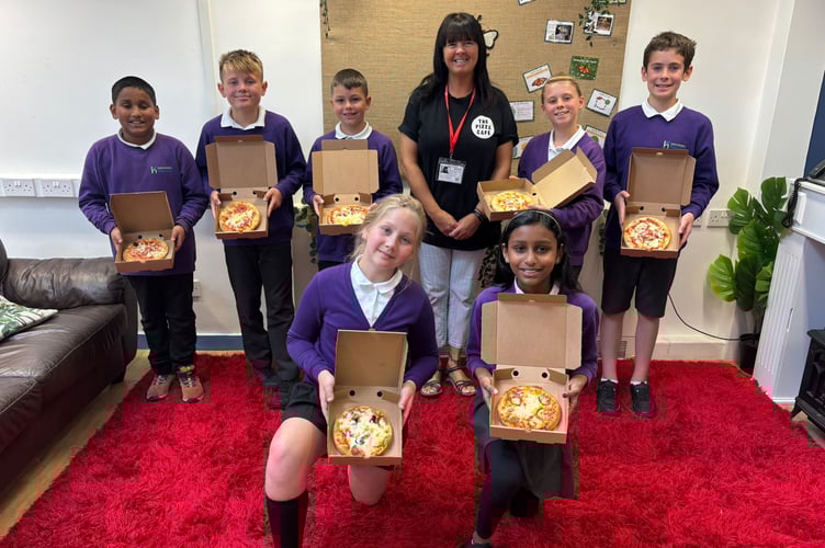 Children from Highweek Primary School made their own pizzas thanks to staff from the Pizza Cafe. 