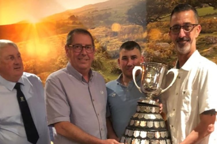 Andy Feaver and Shaun Taylor with the silverware