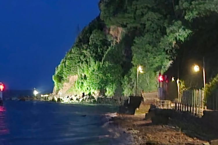 The Ness headland Shaldon lit up in the evening