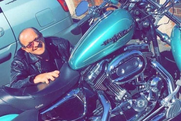 Nicholas (Elvy) Davey with his beloved Harley Davidson