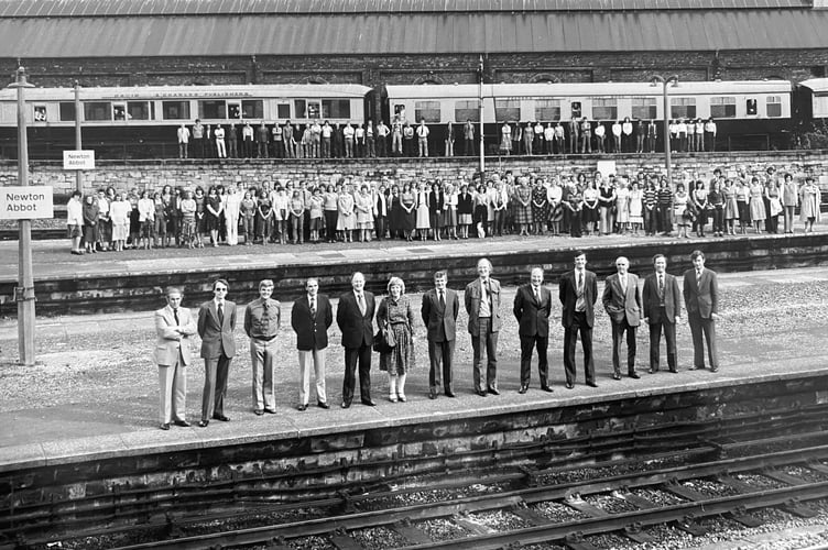 Staff from David & Charles Publishers pose for the camera at Newton Abbot Railway Station in October 1980