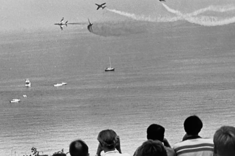 The Red Arrows break over Dawlish in August 1995