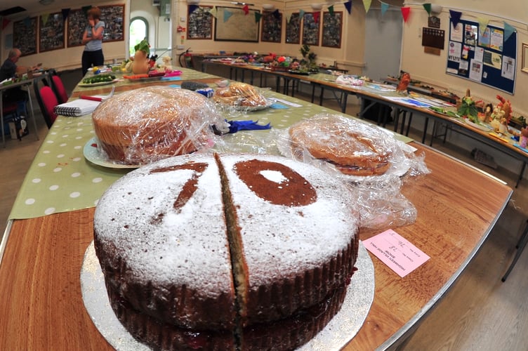 Highweek Village Show. Chocolate sponge cake celebrates 70 years of the show