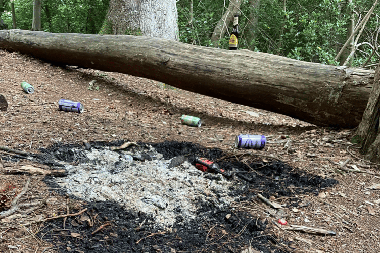 There was remnants of a fire, discarded bottles and cans of alcohol and a vape