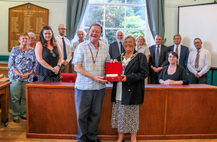 John Germon becomes the first Freeman of Ashburton, handed his award by Mayor Ann Bovey. Photo Ashburton Town Council