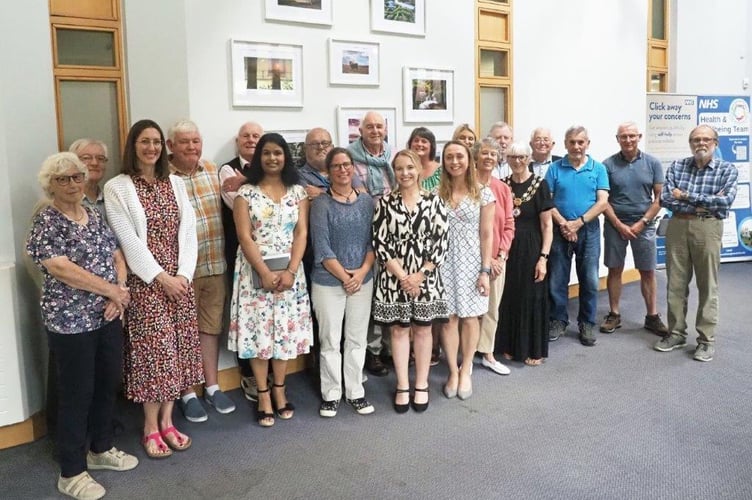 Surgery staff and volunteers at the celebration event at Bovey Tracey Surgery. Photo Jon Arnold 