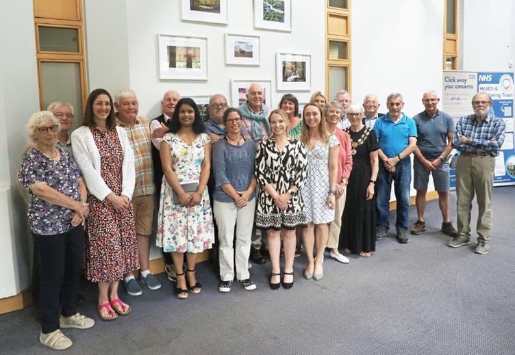 Surgery staff and volunteers at the celebration event at Bovey Tracey Surgery. Photo Jon Arnold
