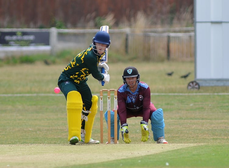 Devon Cricket League A Division.  Torquay & Kingskerswell 1st XI versus Bovey Tracey 1st XI. Bovey's Jake Pascoe and Torquay&Kingskerswell 'keeper Nathan Roux
